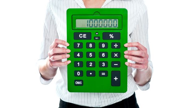 Focus on green calculator. Woman holding. Business concept