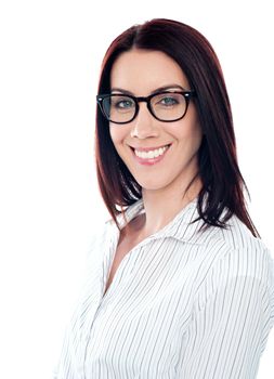 Smiling business lady in eyeglasses. Close to camera