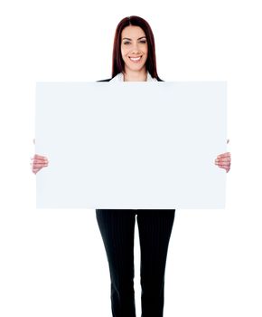 Caucasian businesswoman holding a blank billboard isolated on white background
