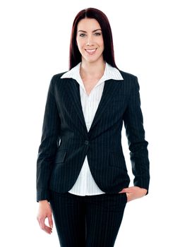 Beautiful businesswoman smiling at camera isolated over white background