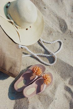 Some beach items lying on sand