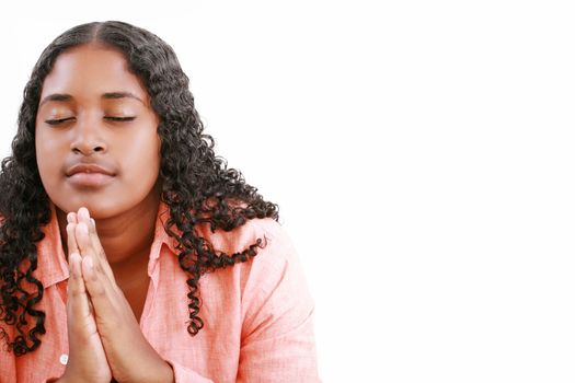 woman praying isolated on a white background.