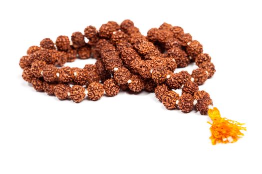 Buddhist or Hinduist Japa mala (prayer beads) made of rudraksha isolated