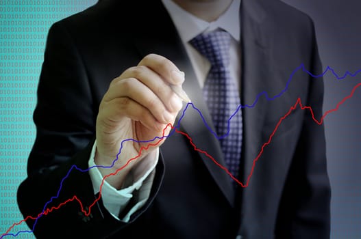 Businessman analysis the stock exchange graph