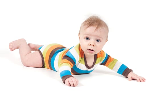 Shot of little baby lying on white background