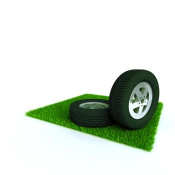 car wheels on a lawn with a green bright grass
