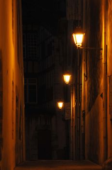 Three Lamps in the Night from a little street