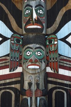 Wooden totem pole, monumental sculpture carved from large tree