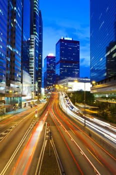 Hong Kong at night, traffic in city.