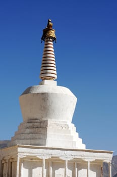 Landmark of white stupa in a Tibetan lamasery