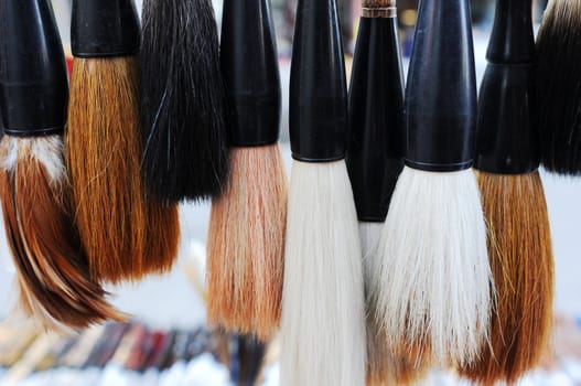 Closeup view of a bundle of Chinese brush pens for calligraphy