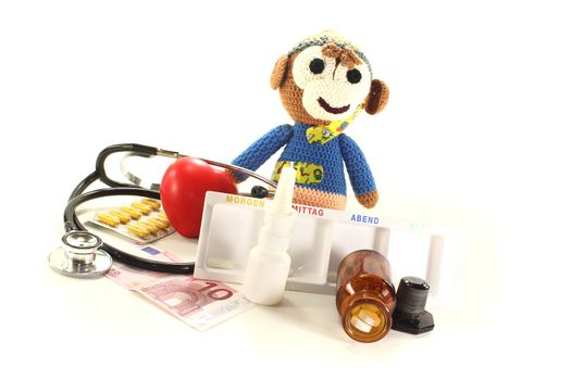 Pediatrician - with crochet monkey, money, medicine box, stethoscope and pills