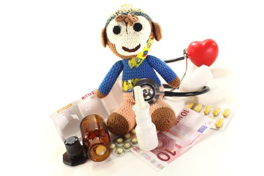 Pediatrician - with crochet monkey, money, medicine box, tablets, apothecary jar and stethoscope