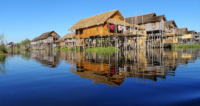 Landscape of wooden houses built in water in Myanmar