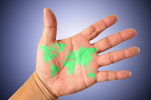 Human hands holding map world