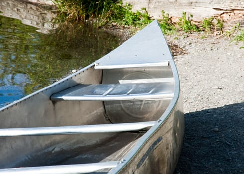 Silver metal canoe