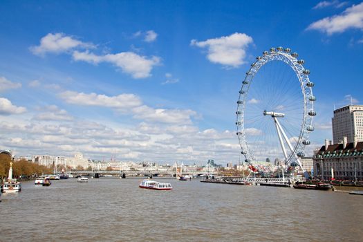 LONDON - April 6: London Eye along River Thame, on April 6, 2012 in London. The largest Ferris wheel in Europe, structure of the London Eye is 135 M. tall and the wheel has a diameter of 120 M.