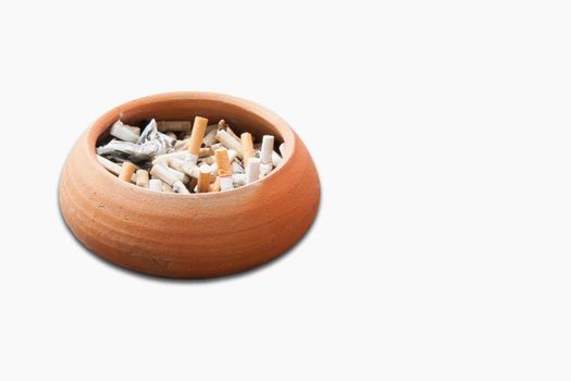 Side view of ashtray full of cigarette stubs