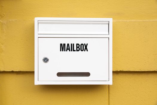 White Mailbox on the yellow wall