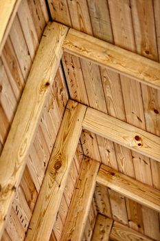 The construction is a wooden roof - inside view