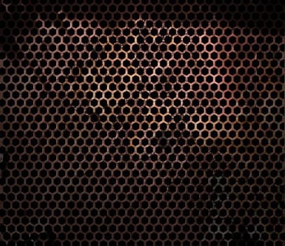 Rusty hexagonal metal perforated grunge grille