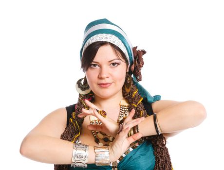 Oriental dancer in blue costume over white background