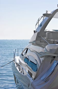 prow of ship white color, loosened on turquoise waves