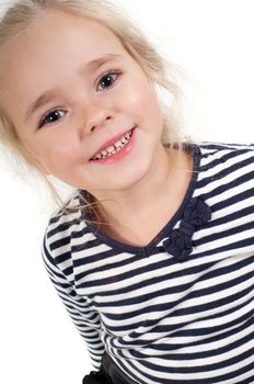 Studio portrait of little cute girl in striped top