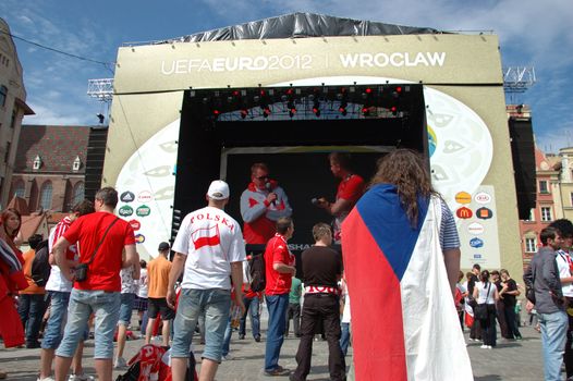 WROCLAW, POLAND - JUNE 8: UEFA Euro 2012, fanzone in Wroclaw. Czech and Polish fans in front of stage on June 8, 2012.