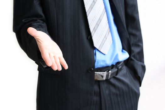 Young business man giving hand for handshake