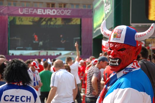 WROCLAW, POLAND - JUNE 8: UEFA Euro 2012, fanzone in Wroclaw. Czech fan with devil mask on June 8, 2012.