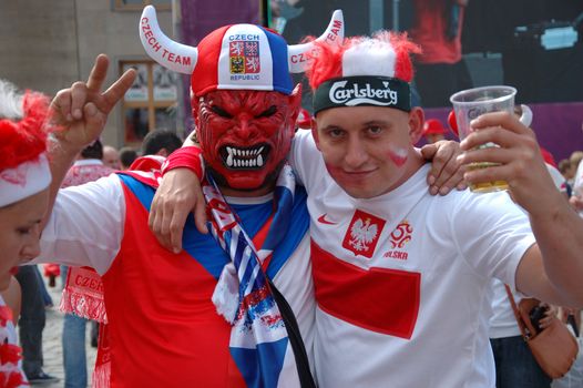 WROCLAW, POLAND - JUNE 8: UEFA Euro 2012, fanzone in Wroclaw. Czech and Pole football fans together on June 8, 2012.