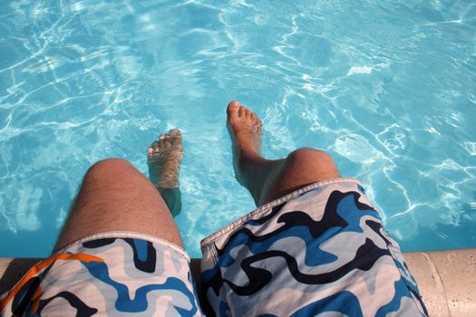 posing in the swimming pool for the photographer