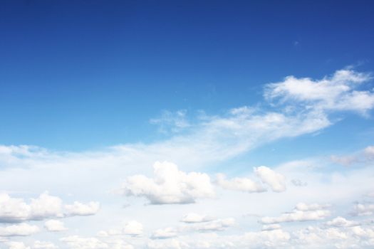 white clouds on blue sky in season