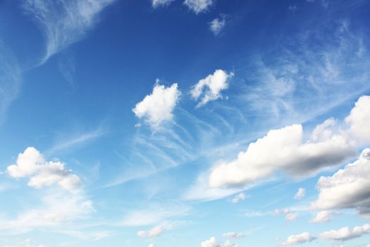 white clouds on blue sky in season