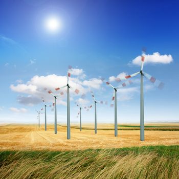 Wind turbine generate electricity on a sunny day