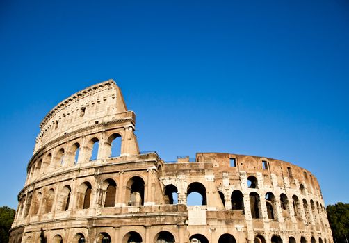 Colosseum in Rome with blue sky, landmark of the city