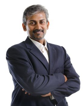 Good looking mature Asian Indian male with business suit isolated on white background