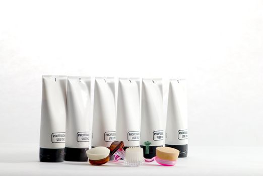 Various professional spa products arranged on a white background