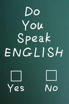Do you speak English - question written with chalk on a green board, with yes or no check boxes