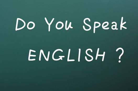 Do you speak English - question written with chalk on a green board