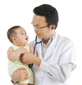 Children's doctor exams infant with stethoscope