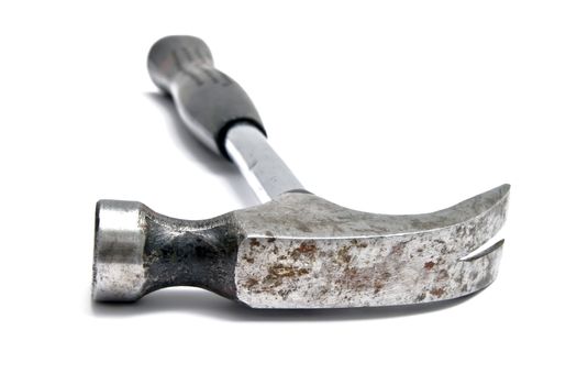 An old Hammer isolated on white background 

