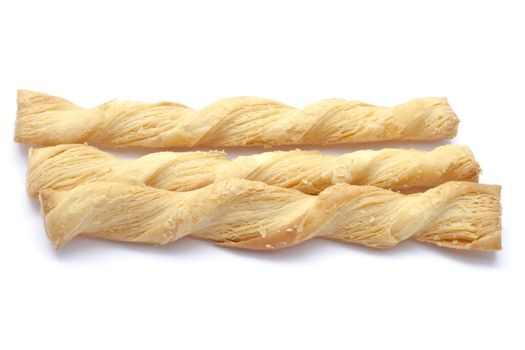 Butter salted twists closeup on white background