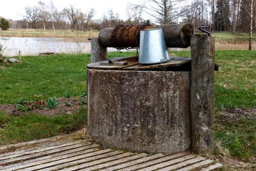 old concrete water well in the countryside
