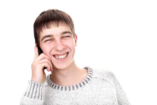 happy young man with mobile phone isolated on the white background