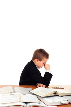 very sad schoolboy crying on the table isolated on the white background