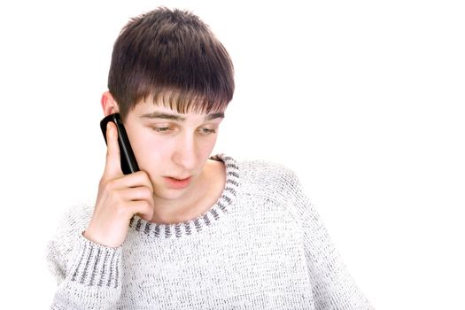 dissatisfied young man with mobile phone isolated on the white background