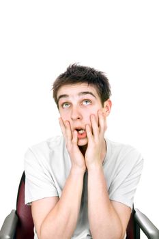 funny and amazed young man isolated on the white background