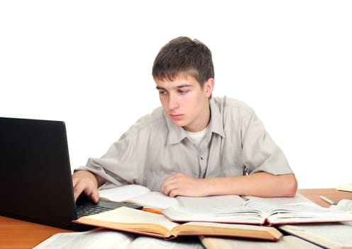 young male student working with many books on the table